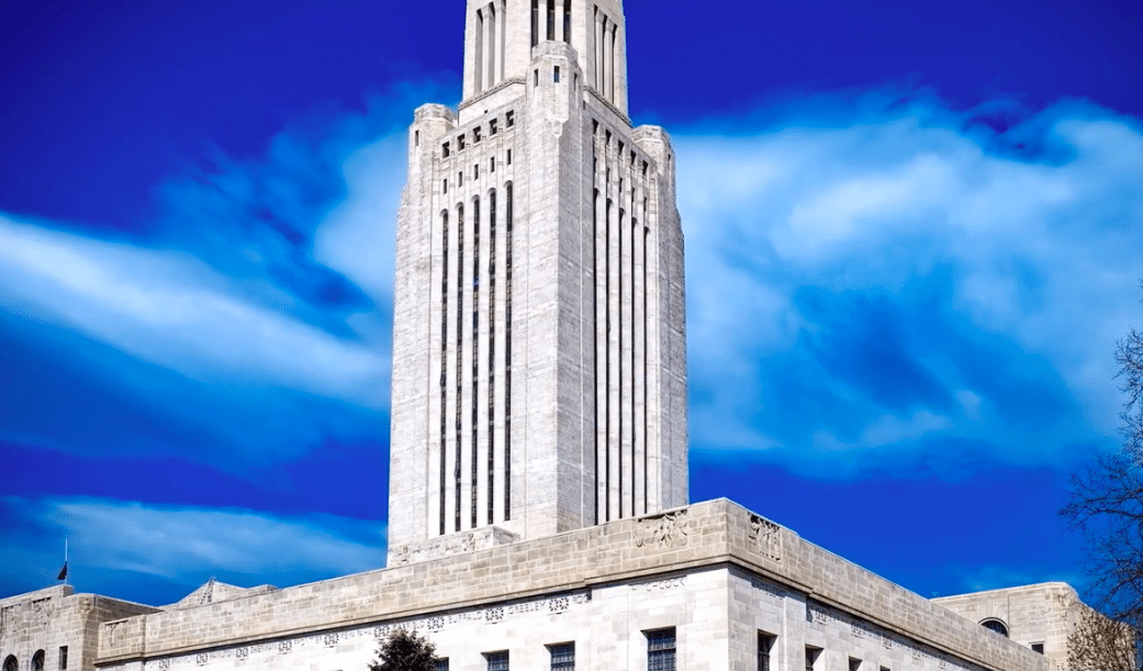 a very tall building with a clock on it's side.