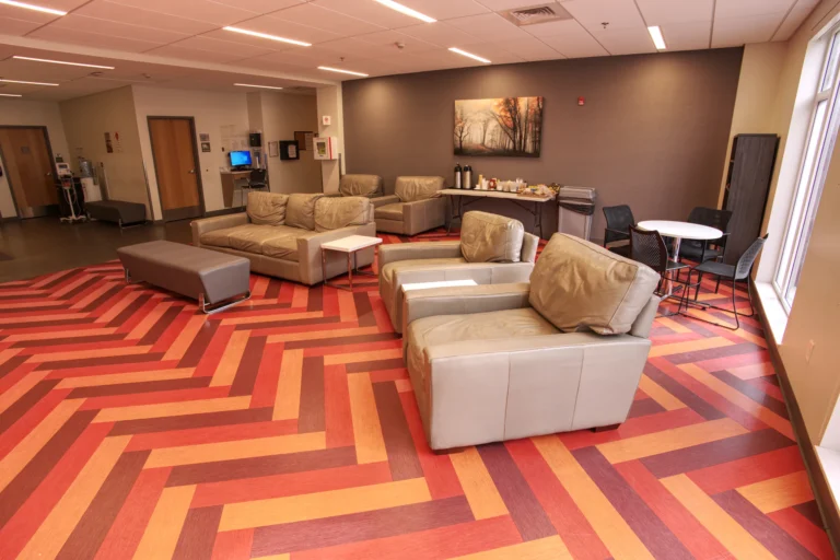 The Recovery Village Cherry Hill at Cooper Drug and Alcohol Rehab near Philadelphia rec lounge with movies scaled