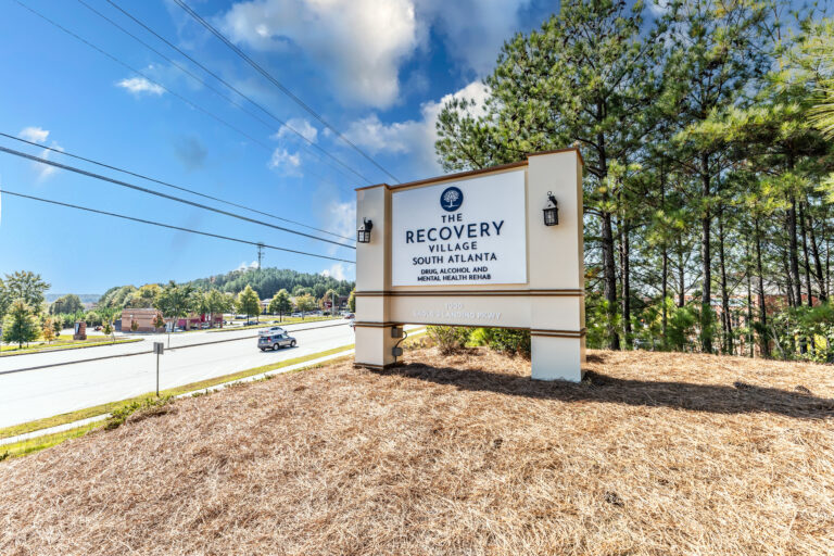 The Recovery Village South Atlanta Drug, Alcohol and Mental Health Rehab - Street view of sign at facility entrance